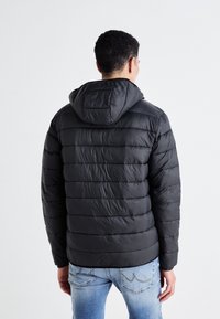 Jack & Jones JJVINCENT PUFFER HOOD - Light jacket - dark grey