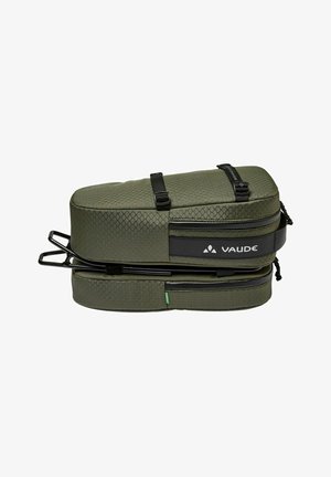 Groene Vaude tas met een gestructureerd oppervlak, twee ritscompartimenten, verstelbare schouderbanden en een stevig metalen frame. Compact en gestroomlijnd ontwerp.