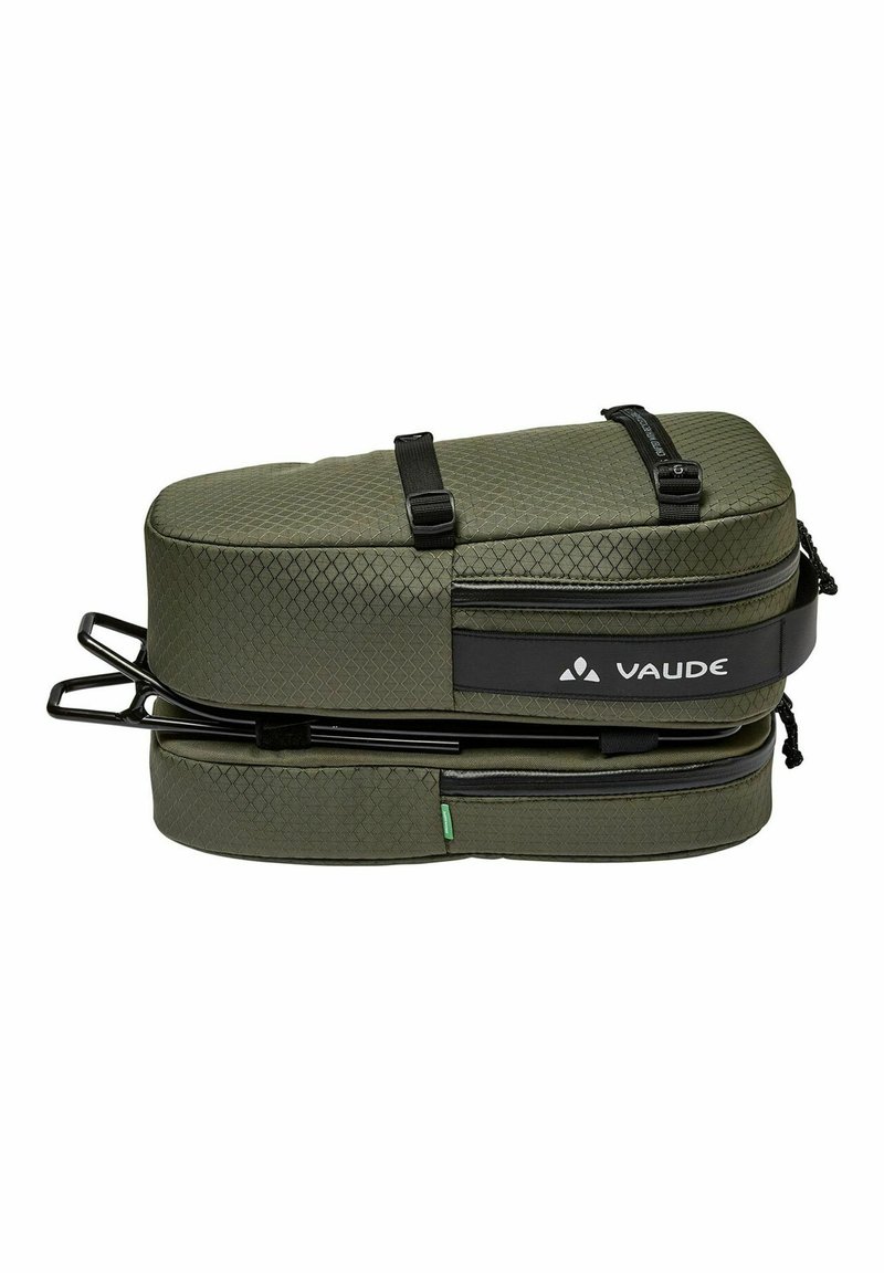 Grüne Vaude-Tasche mit strukturierter Oberfläche, zwei Reißverschlussfächern, verstellbaren Trägern und einem stabilen Metallrahmen. Kompaktes und schlankes Design.