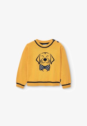 Pull jaune pour enfant avec un visage de chien souriant et un nœud papillon à carreaux, présentant des bordures noires et deux boutons sur l'épaule.