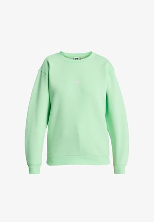 Pull en vert menthe avec un col rond, des poignets et un ourlet côtelés, arborant un petit logo blanc au centre. Tissu doux avec une coupe décontractée.