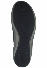 Suela de zapato de goma negra con textura estriada y patrón circular en el talón. Presenta un borde gris y el nombre de la marca "legero" grabado.