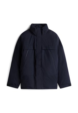 Donkerblauwe geïsoleerde jas met een hoge kraag, twee voorzakken en contrasterende ritsen. Duurzame stof, recht gesneden en minimale details.