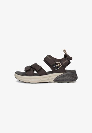 Sandalo da esterno marrone con cinturini regolabili, logo Jeep marchiato, suola beige imbottita e presa testurizzata sul tallone, progettato per escursionismo o uso casual.