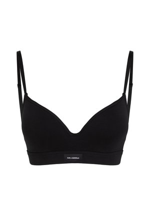 Zwarte bralette met dunne verstelbare banden, een diepe V-halslijn en een gladde textuur. Heeft een logo band aan de onderkant.