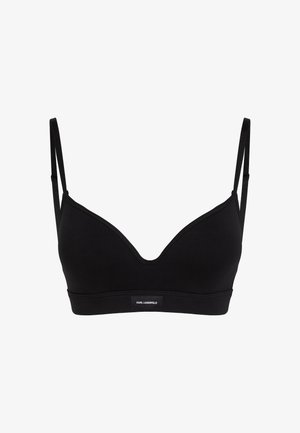 Musta bralette ohuiden säädettävien olkaimien kanssa, syvän V-aukkoisen muotoilun ja sileän pinnan kanssa. Alareunassa on logonauha.