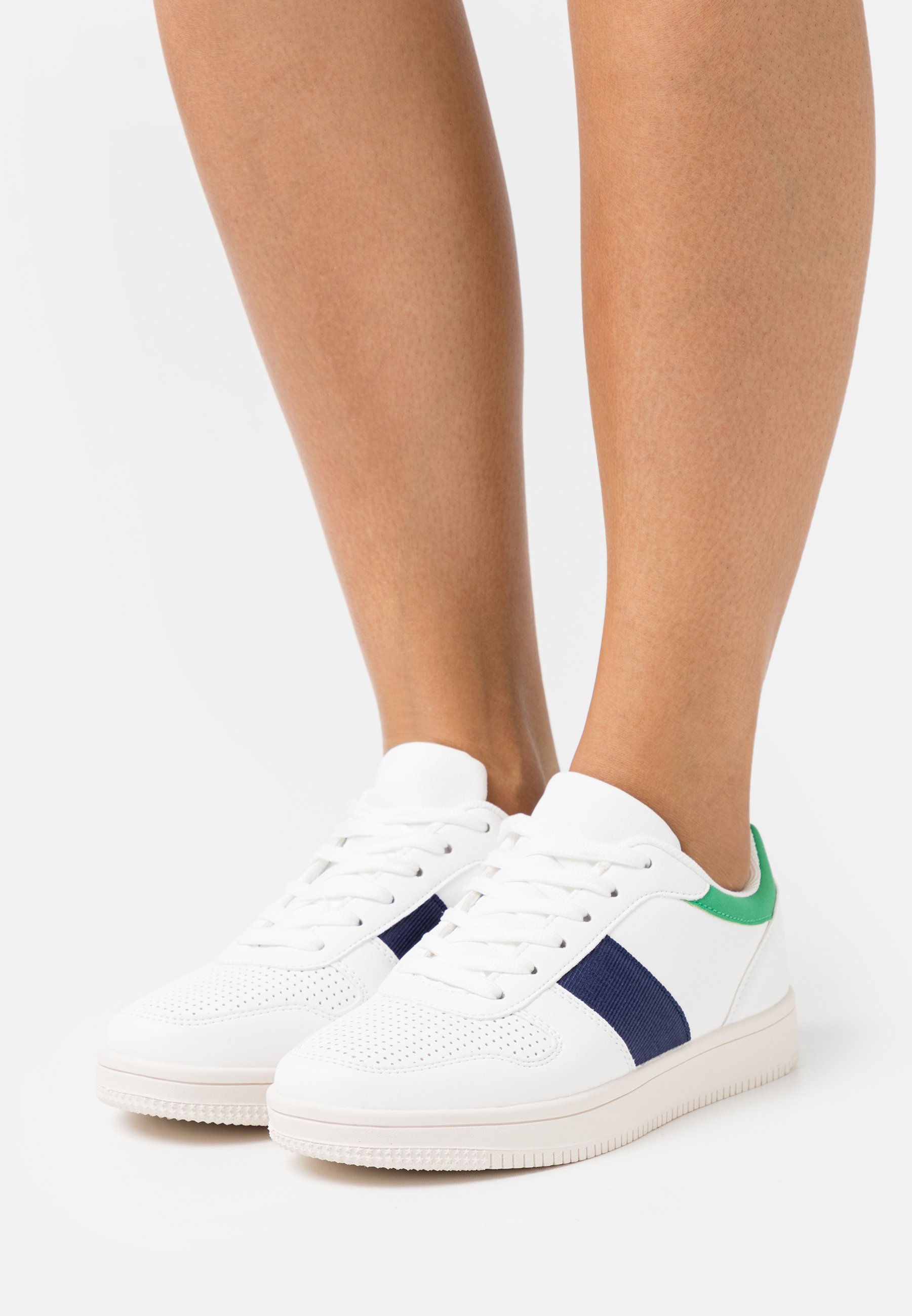 green retro trainers