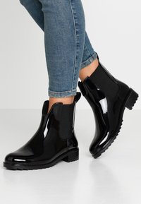 Rieker Bottes en caoutchouc - black
