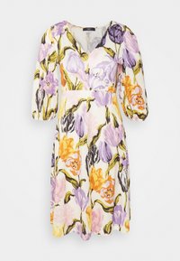 Blumenkleid mit V-Ausschnitt, Puffärmeln und taillierter Passform. Hergestellt aus leichtem Stoff mit mehrfarbigen Tulpenmustern auf einem cremefarbenen Hintergrund.