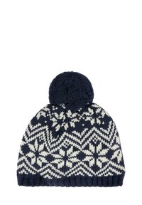 Cappello invernale lavorato a maglia blu navy e bianco con motivo a fiocco di neve e una grande pompon in cima.