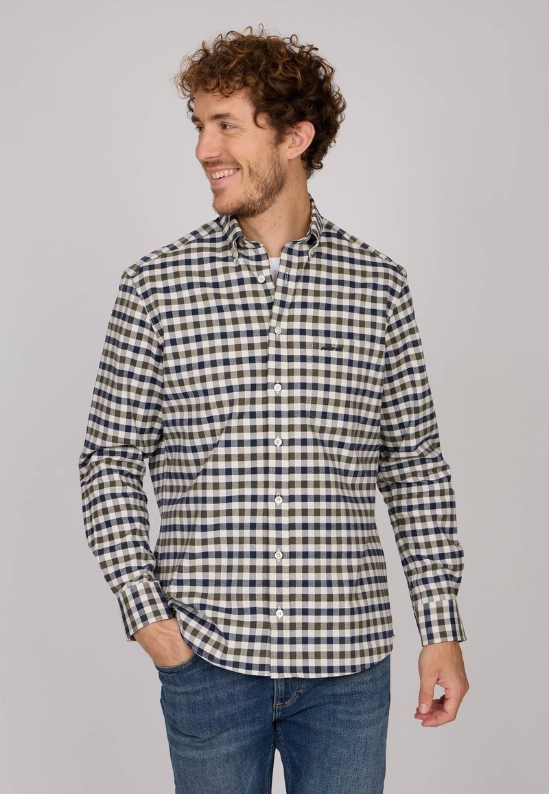 Chemise à carreaux en marine, blanc et gris clair. Design à boutons avec un col, des manches longues et un ourlet arrondi. Détail de logo subtil.