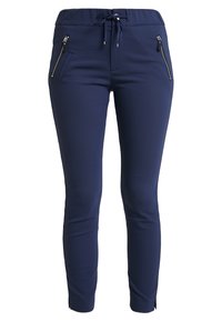 Marinblå byxor i ett slätt tyg, med elastisk midja, dragsko och två fickor framtill med dragkedja. Slim fit-design.