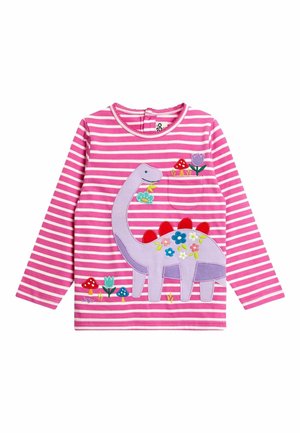 Pitkähihaista paita, jossa on vaaleanpunaisia ja valkoisia raitoja, ja jossa on violetti dinosauruksen grafiikka, jota koristavat värikkäät kukat ja sienet.