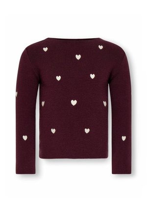 Pull à manches longues rouge foncé avec des motifs blancs en forme de cœur répartis sur le dos et les manches.