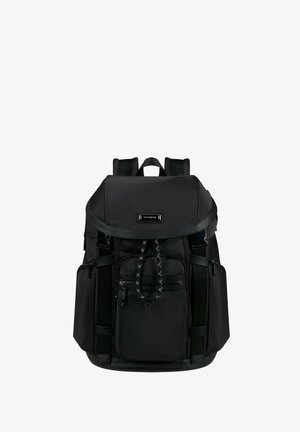 Black Samsonite backpack with drawstring closure, front and side zip pockets, and padded shoulder straps.