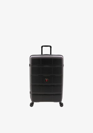 Black hard-shell suitcase with telescopic handle extended and four swivel wheels, standing upright on a white background.