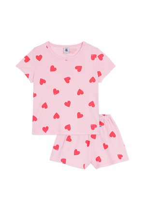 Ružový bavlnený pyžamový set pozostávajúci z topu s krátkym rukávom a zodpovedajúcich šortiek, oba s rozptýleným vzorom červených srdiečok. Mäkký materiál a elastický pás.