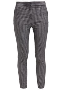 Svartvita slim-fit byxor med elastiskt midjeband och ett litet, upprepande geometriskt mönster över hela tyget.