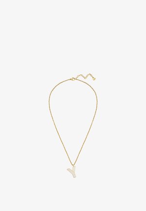 Collier délicat en chaîne d'or avec un pendentif en forme de lettre Y présentant de fines bandes verticales découpées.