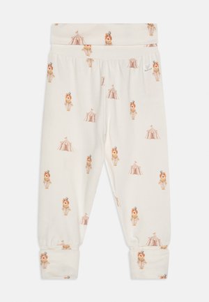 Bebi hlače krem boje s tiskanim cirkuskim šatorima i klaunovima s šeširima, imaju presavijene rubove i mekan elastičan pojas.