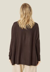 Masai Maglione - coffee bean