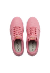 Pink synthetic sneakers with perforated upper, lace closure, and contrasting white rubber sole. "SOFTFOAM" branding visible inside.