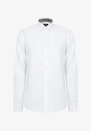 Biała koszula z długim rękawem zapinana na guziki, z kołnierzykiem. Wzór wewnętrzny przedstawia design w paisley. Gładka faktura z przejrzystymi guzikami.