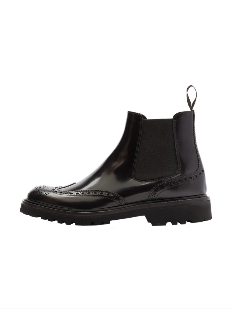 Botas Chelsea de cuero negro con un acabado pulido, detalles de brogue en la puntera, paneles laterales elásticos y suela de goma gruesa.
