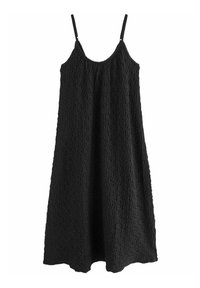 Robe noire avec des bretelles réglables, tissu texturé et coupe ample. Le design présente un col rond et une longueur mi-mollet.
