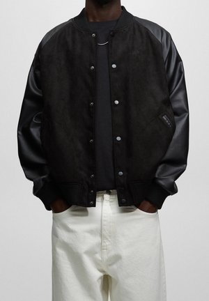 Veste en similicuir - mottled black
