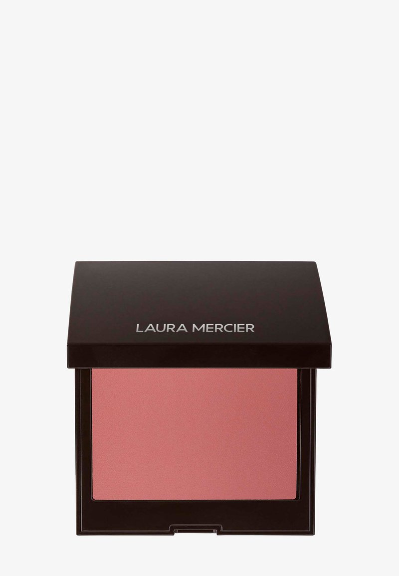 Rouge kompakt med et svart kvadratisk etui. Har et mykt rosa pudder inni, jevn tekstur og et enkelt, minimalistisk design.