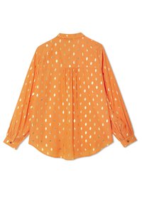 Langärmlige orange Bluse mit lockerer Passform, die ein goldfarbenes Punktemuster, knöpfbare Manschetten und eine Mittelnaht für zusätzlichen Fall aufweist.