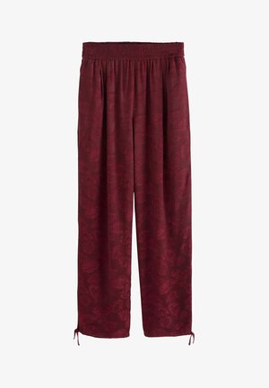 Burgundy, loose-fitting pants with an elastic waistband, featuring a subtle floral pattern and adjustable ties at the hem. Smooth texture.