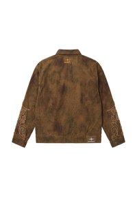 Veste marron usée avec des motifs tourbillonnants brodés sur les manches, poignets boutonnés et petit logo jaune PXP en haut du dos et en bas à droite.