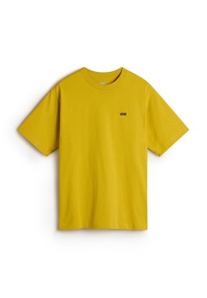 Geel katoenen T-shirt met korte mouwen en een ronde hals. Klein zwart "VANS" logo op de linkerkant van de borst. Soepele textuur.