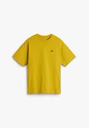 Keltainen puuvillainen t-paita lyhyillä hihoilla ja pyöreällä kaula-aukolla. Pieni musta "VANS"-logo vasemmassa rinnassa. Sileä kangas.