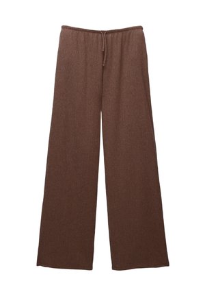 Brązowe, dzianinowe spodnie o szerokich nogawkach z elastycznym pasem i sznurkiem do wiązania z przodu, ułożone płasko na białym tle.