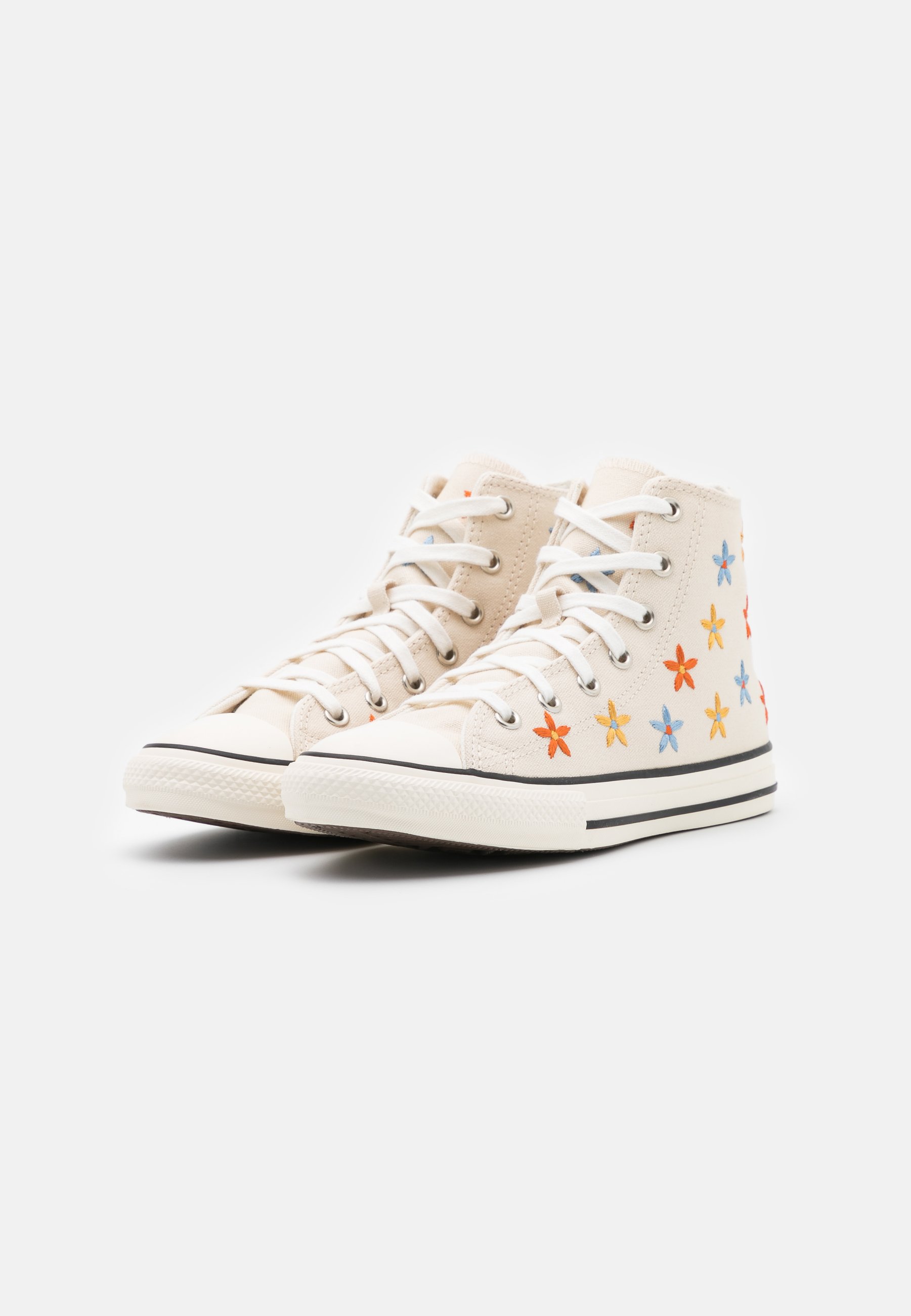 white studded converse high tops