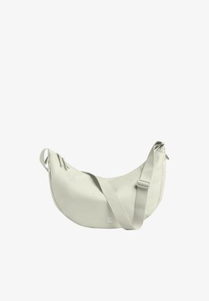 Hellbeige, halbmondförmige Schultertasche mit verstellbarem Riemen und Reißverschluss, mit kleinem "GOT BAG" Logo nahe der unteren Mitte.