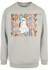 Svetlošedá mikina s potlačou karikatúrneho ducha a opakovaným textom "SPooky" v mnohobarevných, opotrebovaných písmach. Mäkký, bavlnený materiál.
