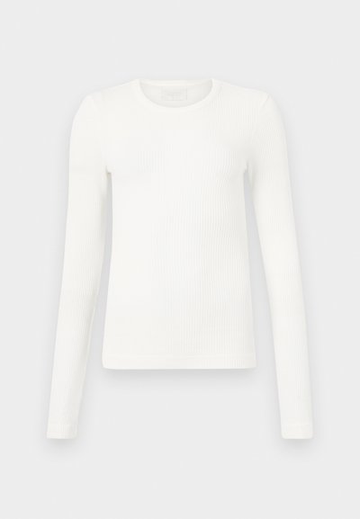 White long-sleeve ribbed top with a crew neck, featuring a fitted design and smooth texture, suitable for layering or casual wear.