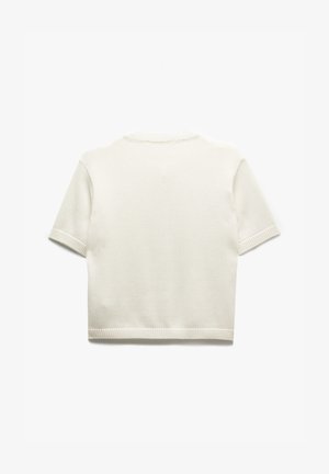 Korte mouw, crèmekleurige gebreide trui met een gestructureerd patroon, geribbelde kraag en zoom. Heeft een cropped ontwerp.