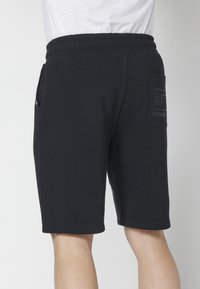 Koroshi BERMUDA JOGGER - Kratke hlače - black