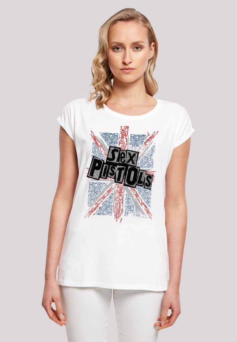White cotton t-shirt with rolled sleeves featuring a Union Jack design and black "Sex Pistols" text centered on the front.