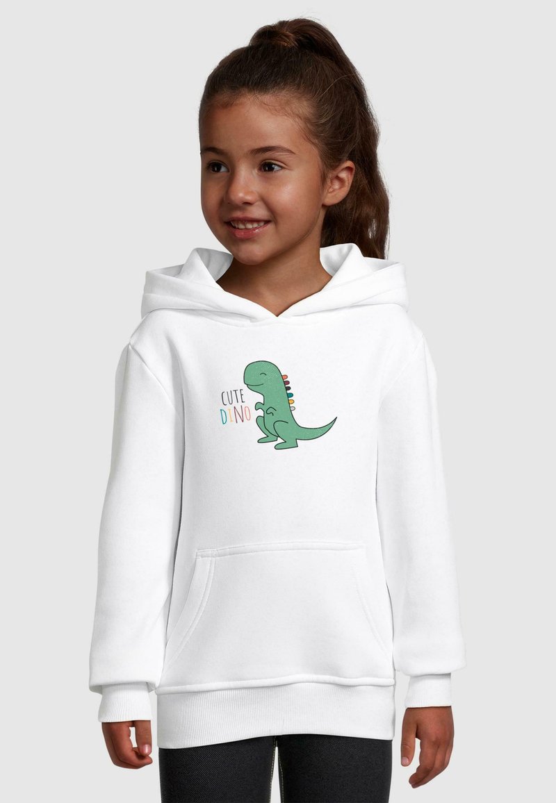 Felpa bianca con tasca frontale, decorata con una grafica di un dinosauro verde e il testo "CUTE DINO". Materiale morbido, vestibilità rilassata e polsini a coste.