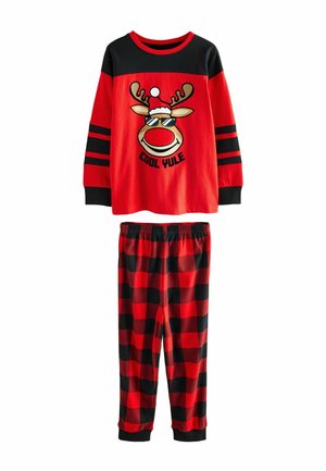 Red and black pajama set featuring a long-sleeve top with a reindeer graphic and striped accents, paired with plaid pants. Soft cotton material.