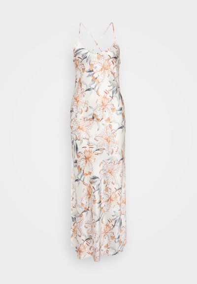 Floral maxi dress in soft, lightweight fabric. Features a cream base with large orange and gray lilies, and thin crisscross straps.