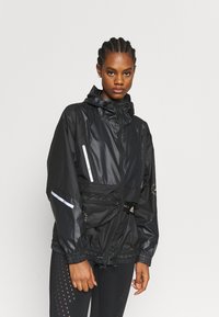 Adidas By Stella Mccartney Sportinė Striukė Black Juoda Zalando Lt