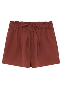 Šortky v rezavé barvě vyrobené z měkké tkaniny, s elastickým pasem na šňůrku a volným střihem, ideální pro pohodlí.