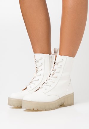 Platform ankle boots - white